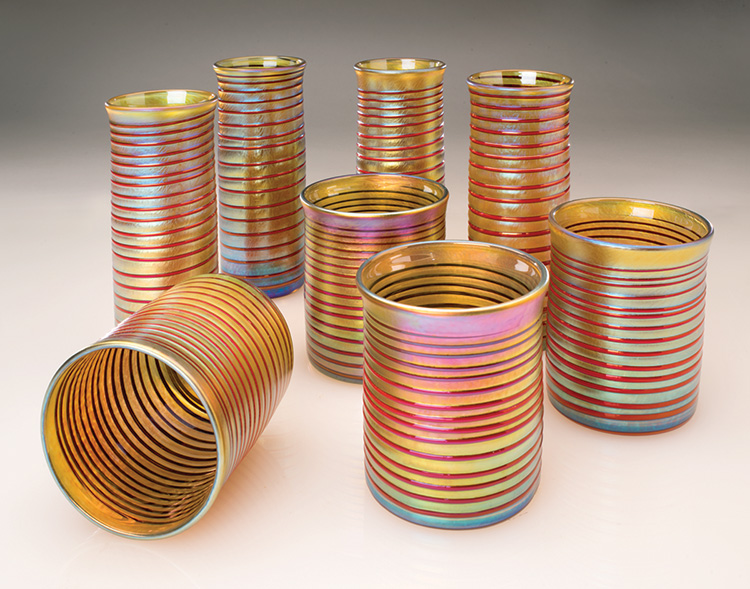 gold with red tumblers